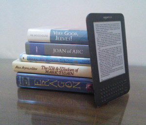 My Kindle with  some of the books  I'm currently reading.